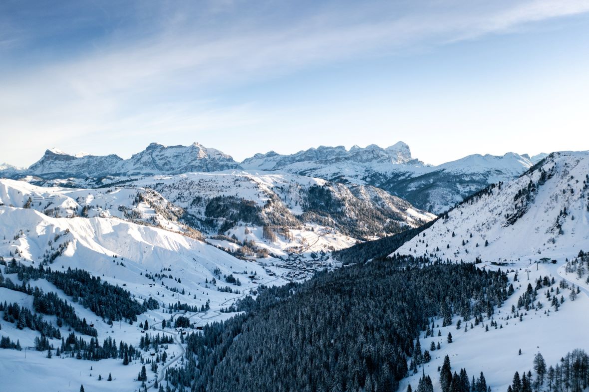Road to Arabba ski resort in winter surrounded by snowy mountains