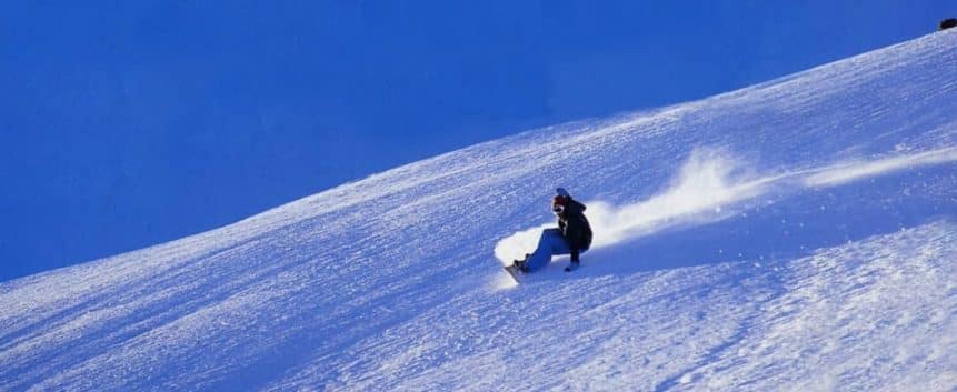 Snowboarding in the Vallnord ski area above Arinsal in Andorra